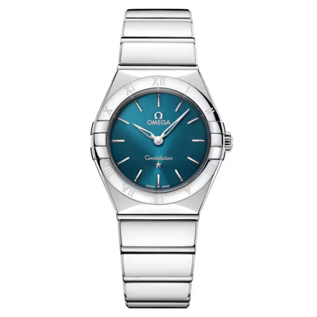 The OMEGA Constellation Quartz 28mm Watch features a peacock blue dial, silver hour markers, Roman numeral bezel, minimalist design, and a sleek stainless steel bracelet.