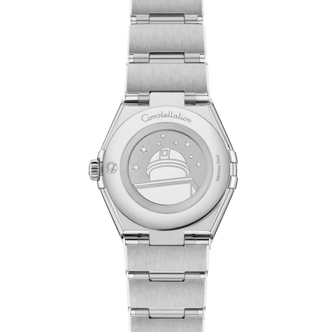 The OMEGA Constellation Quartz 28mm Watch features an engraved observatory dome with stars and "Constellation" inscribed above on the stainless steel case back, along with a visible metal link bracelet.