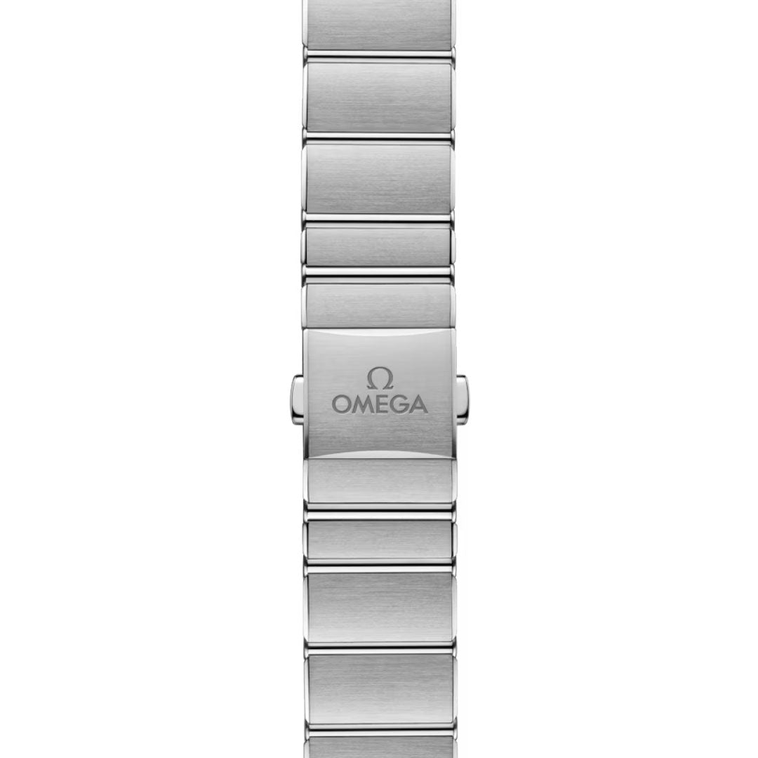 Close-up of the OMEGA Constellation Quartz 28mm Watch’s stainless steel bracelet, featuring a clasp engraved with the OMEGA logo. The brushed links offer a modern finish, showcasing the refined elegance of this OMEGA timepiece.