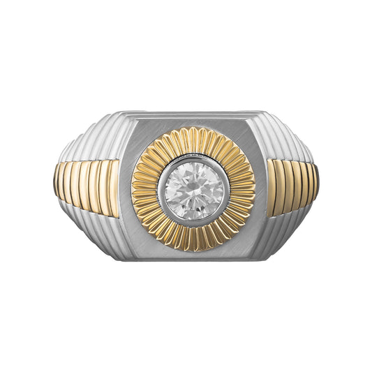 This stunning Raffi&Co.® fashion ring, crafted in 14K yellow and white gold, features a central round GIA-certified diamond. The sides are adorned with fluted gold accents, while a sunburst motif elegantly frames the sparkling gem.