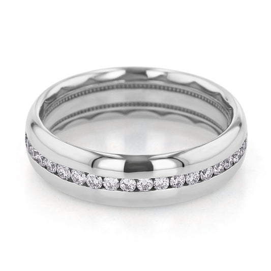 The Tacori Channel Set Diamond High Polish Finish 18K White Gold Men's Round Brilliant Diamond Wedding Band showcases channel-set diamonds that sparkle around the center, illuminating its polished surface. This ring's sleek and symmetrical design radiates elegance and sophistication, offering a soft comfort fit perfect for daily wear.