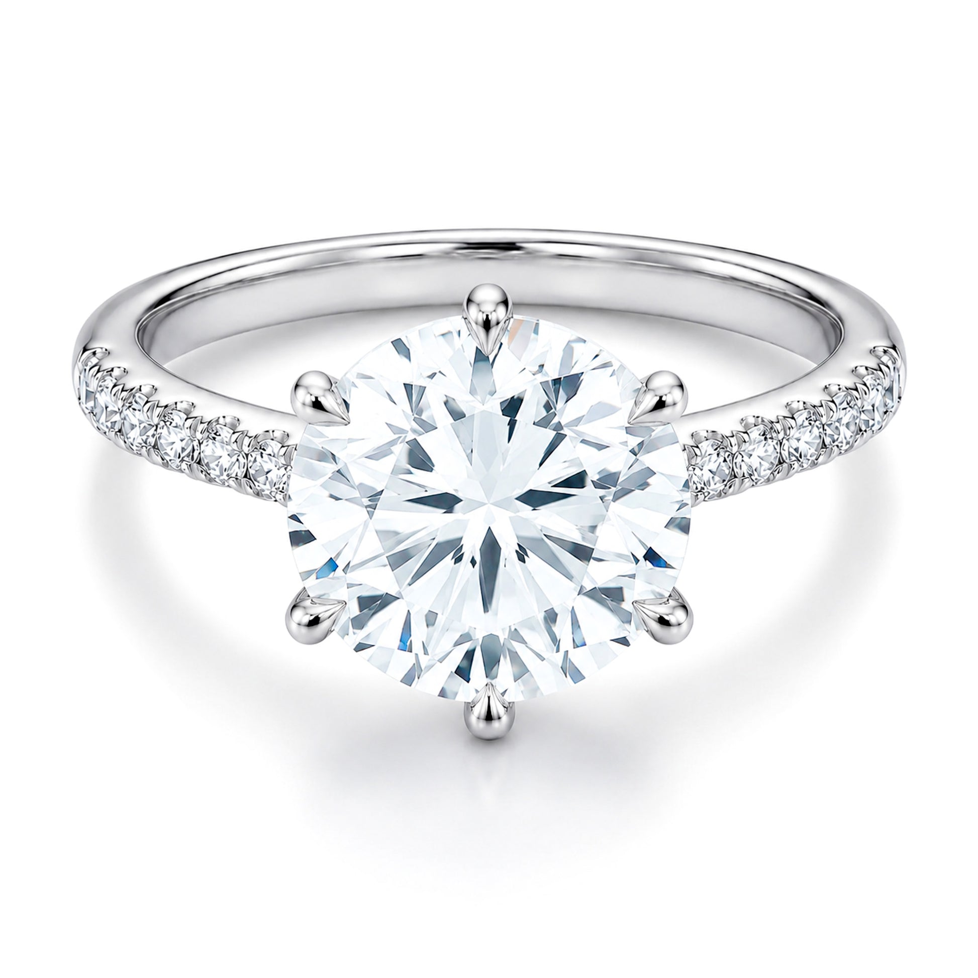 The Raffi&Co.® 14K White Gold Round Brilliant Diamond Halo Engagement Ring features a brilliant round center diamond and sparkling accent diamonds along the band, all in an elegant setting by Raffi&Co.
