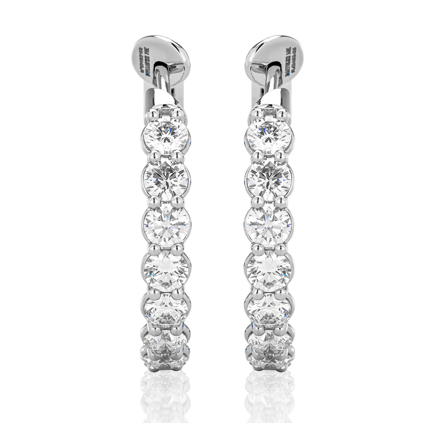 Introducing the Raffi&Co.® 14K White Gold Diamond Hoop Earrings, featuring a row of dazzling round brilliant diamonds set against a plain white background, these earrings embody elegance and radiance.