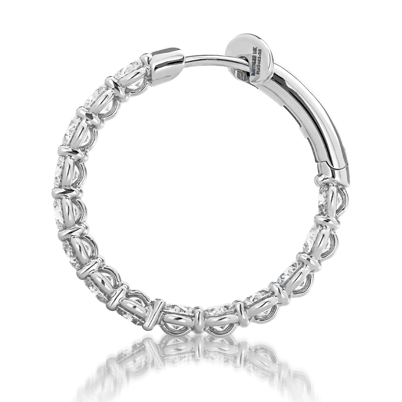 The Raffi&Co.® 14K White Gold Diamond Hoop Earrings, featuring an intricate looped design and clasp closure and adorned with round brilliant diamonds, are displayed on a white background.