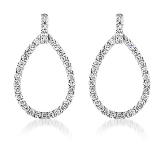 Introducing the Raffi&Co.® 14K White Gold Diamond Drop Earrings: a sophisticated pair featuring an elegant teardrop shape, crafted in white gold and adorned with glistening diamonds, showcased against a minimalist white background.