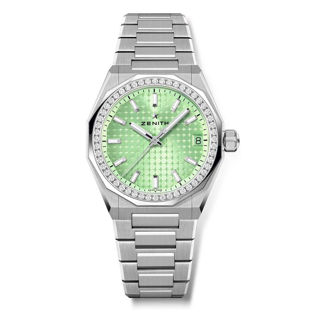 The ZENITH Defy Skyline Elite 670 36mm Watch from Zenith features a metallic strap, mint green textured dial, diamond-set bezel, hour markers, and a date display at 3 o'clock. This watch is powered by automatic movement, ensuring precision and elegance.