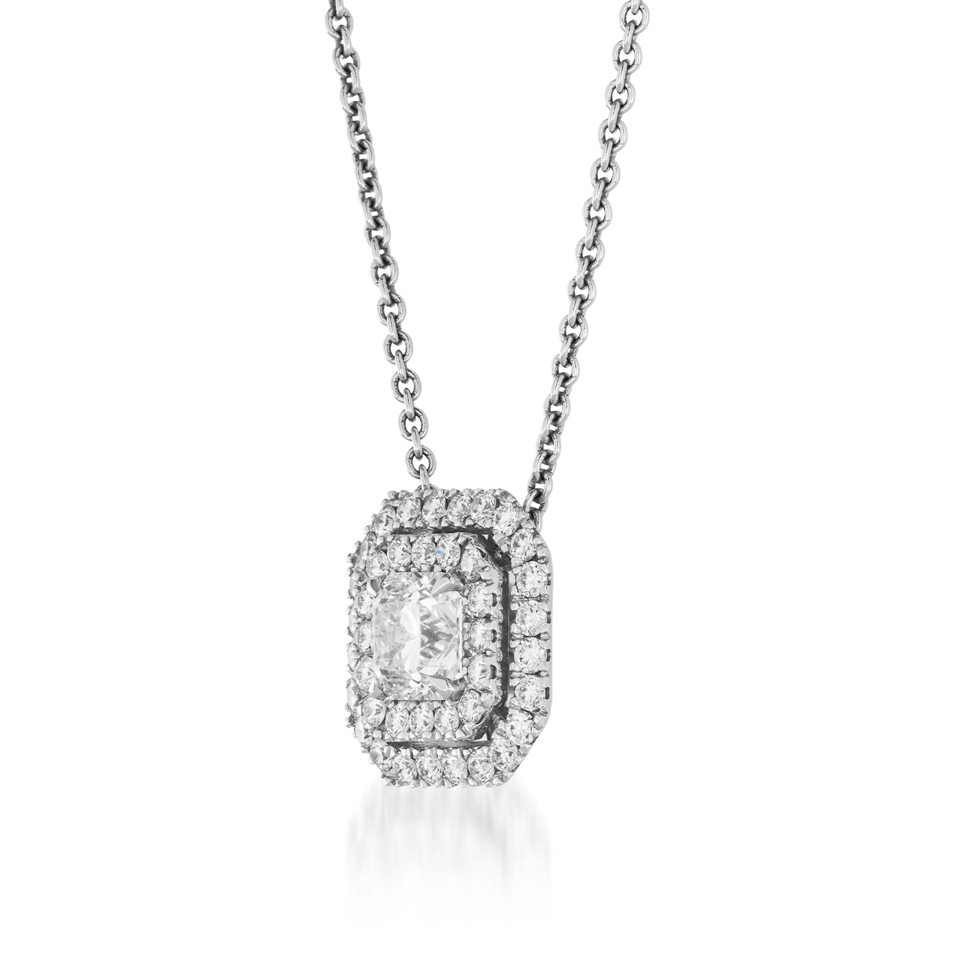 The Raffi&Co.® 14K White Gold Diamond Pendant Necklace exudes a luxurious sparkle with its octagonal diamond framed by a double halo of smaller diamonds. Suspended gracefully from a delicate chain, this piece from Raffi&Co highlights an elegant design.