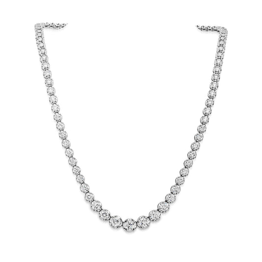 Make an unforgettable impression with the Raffi&Co.® 18K White Gold Round Brilliant Diamond Tennis Necklace. This luxurious piece features graduated diamonds set in a prong setting, with each round, sparkling gem elegantly presented against a white background for timeless allure and sophistication.