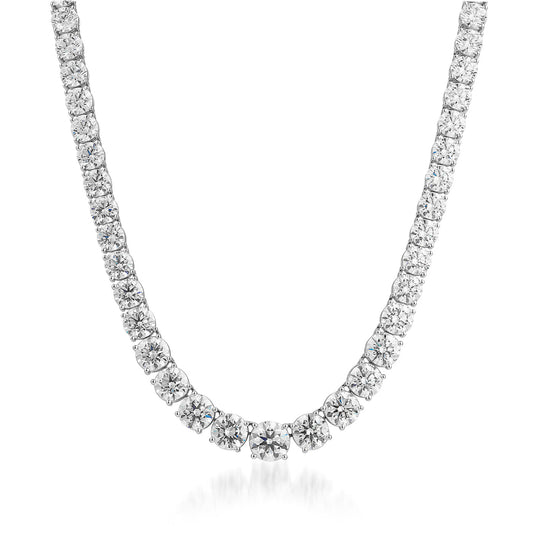 A close-up of the Raffi&Co.® 18K White Gold Graduated Diamond Necklace showcases its exquisite design. This elegant piece from Raffi&Co features a row of round, brilliant-cut diamonds set closely together, forming a continuous line. The GIA certified diamonds subtly decrease in size towards the clasp, creating a graceful and sophisticated aesthetic.