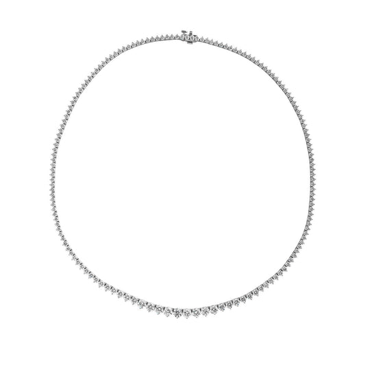 The Raffi&Co.® 18K White Gold Three Prong Diamond Necklace features a series of sparkling gemstones, exuding a luminous and elegant appearance against a plain white background.