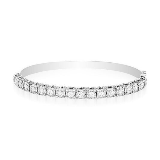 The Raffi&Co.® 18K White Gold Diamond Bangle features evenly spaced, sparkling diamonds that highlight its exquisite craftsmanship. This circular bangle exudes elegance and luxury, with its shiny and reflective surface enhancing the brilliance of each gemstone.