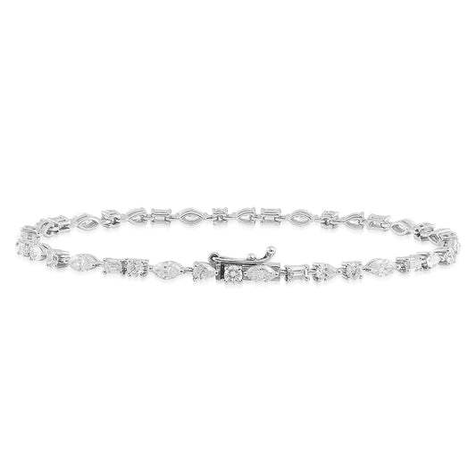 Introducing the Raffi&Co.® 18K White Gold Multi Shape Diamond Bracelet, a stunning piece from Raffi&Co that boasts an exquisite combination of diamond links in round, marquise, and geometric shapes. This elegant bracelet is seamlessly connected and features a sleek, secure clasp, ensuring it remains gracefully fastened on your wrist.