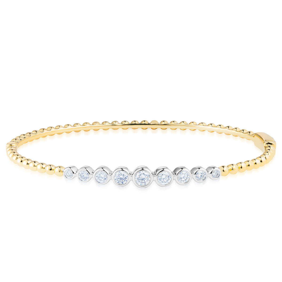 The Raffi&Co.® 18K Yellow Gold Diamond Bracelet showcases a row of small, sparkling diamonds set in silver along the top. The band is crafted with small gold spheres, creating a delicate and elegant design.
