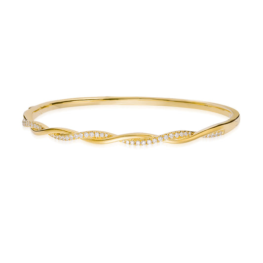 Introducing the Raffi&Co.® 18K Yellow Gold Diamond Bracelet, featuring a twisted design adorned with small, sparkling diamonds along its curves. This bracelet exudes a sleek and elegant appearance, true to the exceptional craftsmanship of Raffi&Co.