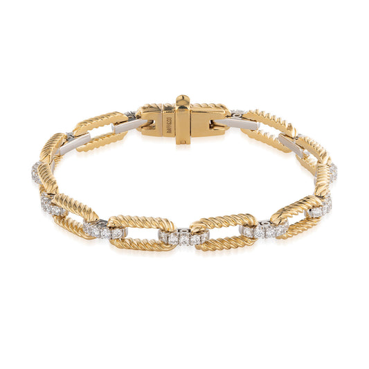 The Raffi&Co.® 14K Yellow Gold Diamond Bracelet showcases an intricate link design, where each link is adorned with rope-like textures and accented with small, round diamonds. This elegant piece is fastened with a clasp, perfectly merging sophistication and luxury in its craftsmanship.