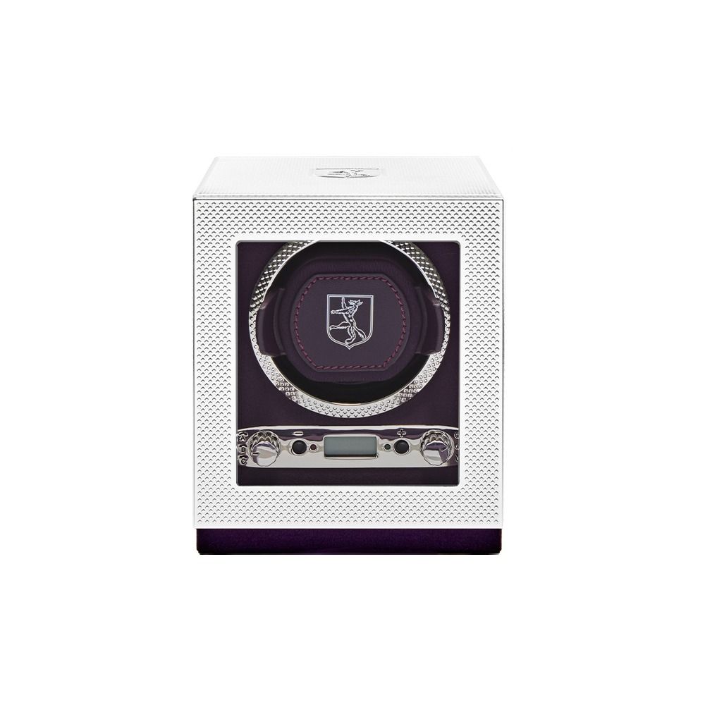 The WOLF 1834 Single Watch Winder Silver by WOLF showcases a white, textured design with a clear front window, elegantly displaying a single watch holder inside. Featuring the signature crest logo and an intuitive control panel below, this piece is an exceptional addition to any luxury timepiece accessory collection.