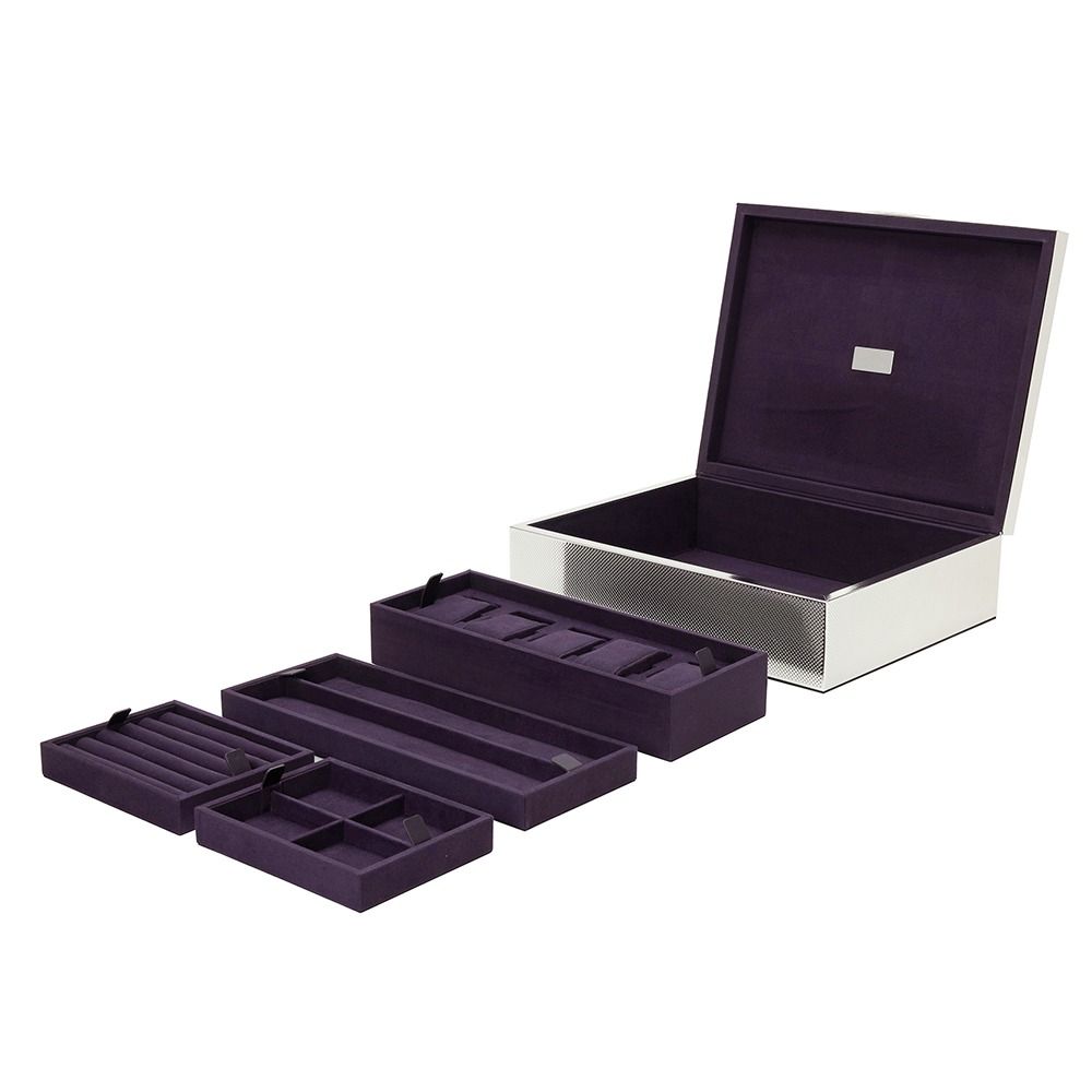 The WOLF 1834 Large Watch/Jewellery & Legacy Box by WOLF features a silver-plated exterior and a purple interior, elegantly open to reveal four removable trays with dedicated sections for organizing rings, earrings, necklaces, and more. Inspired by nearly two centuries of WOLF craftsmanship, this timeless box offers exceptional storage for watches and jewelry.