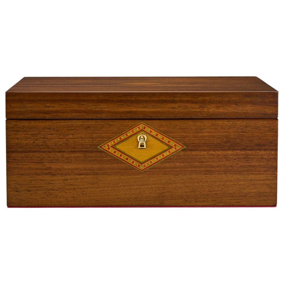 A rectangular walnut WOLF 1834 Nutcracker Musical Jewelry Box featuring a decorative diamond-shaped emblem and a keyhole on the front, shown against a plain white background.