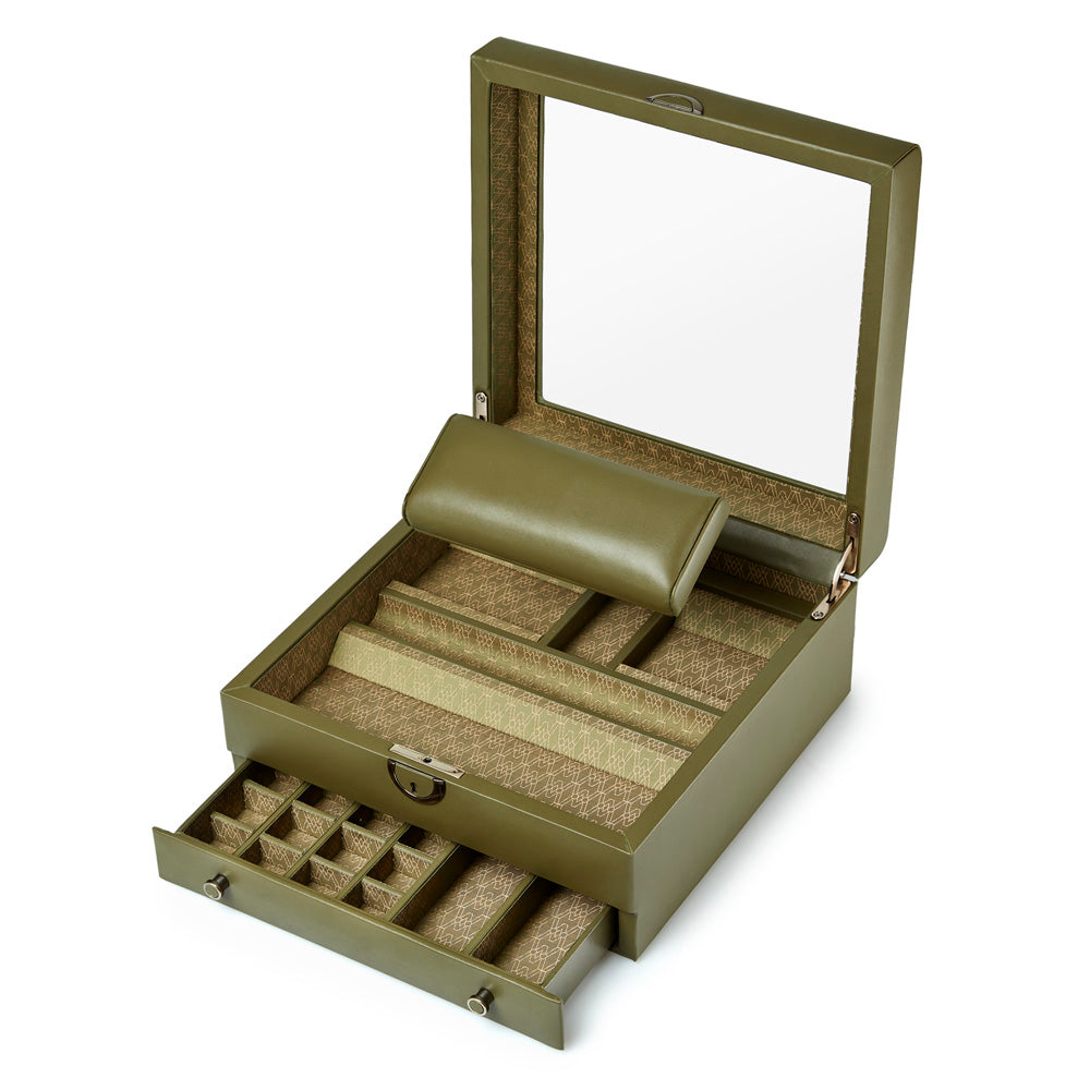 The WOLF 1834 Earth Watch Stand Box, available in an open olive-green design with a mirror inside the lid, boasts limited edition packaging. It features multiple compartments for rings, necklaces, and other types of jewelry, as well as a retractable watch stand in the lower drawer for optimal watch storage.