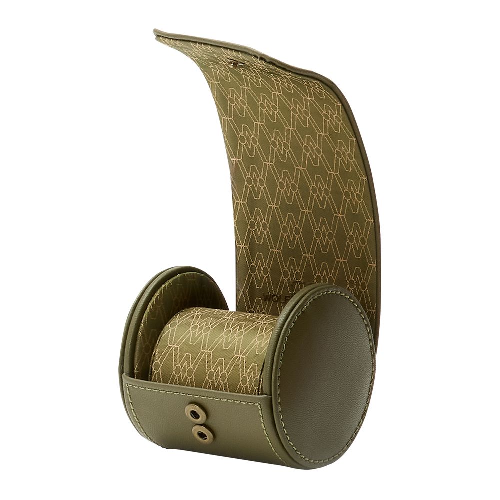 The WOLF 1834 Earth Single Watch Roll by WOLF is a green cylindrical apple leather case with a flap lid, tan geometric interior, recycled satin lining, and front button closures—perfect for storing a single watch.