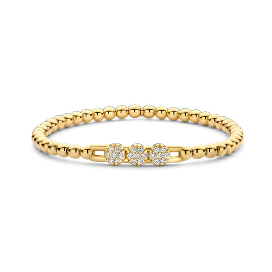 The Hulchi Belluni 18K Yellow Gold Diamond Bracelet features three round diamond clusters totaling 0.30 CTW, elegantly set in a delicate beaded design.