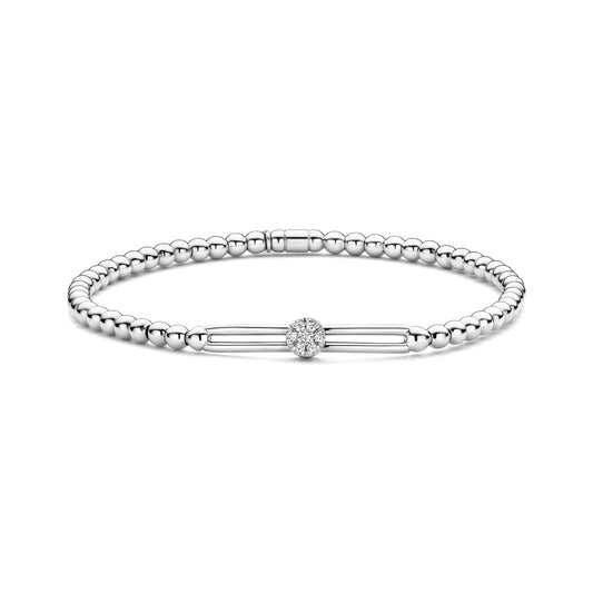 The Hulchi Belluni 18K White Gold Diamond Bracelet features a minimalist beaded design with a polished finish and a central round brilliant diamond accent of SI-VS clarity.