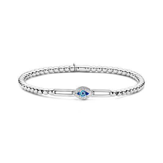 The Hulchi Belluni 18K White Gold Diamond and Sapphire Bracelet features a central evil eye charm with blue and white details, accented by a 0.09 CTW diamond, set on a smooth, reflective white background.