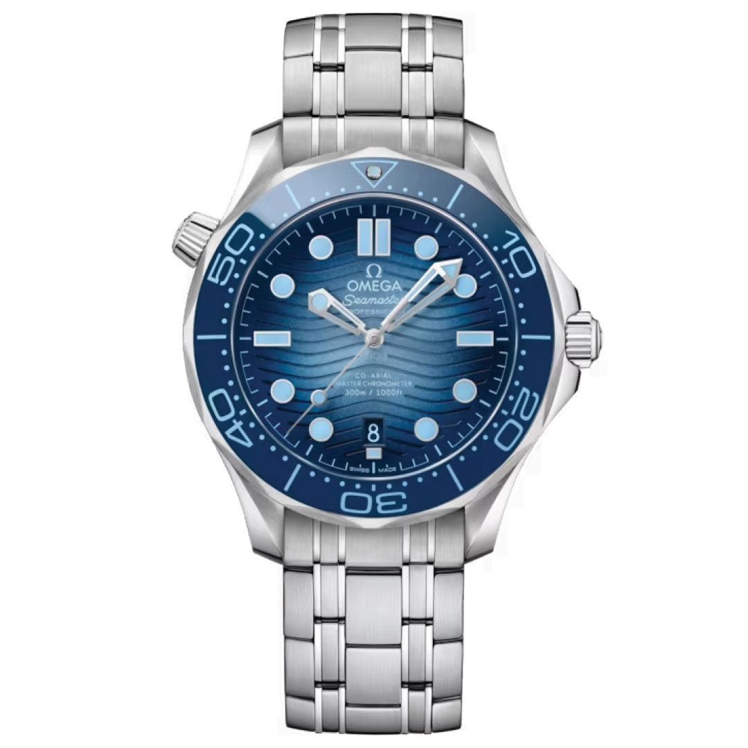 The OMEGA Seamaster Diver 300M Summer Blue Co-Axial Master Chronometer 42mm Watch showcases a distinctive summer blue dial with a wave pattern, complemented by luminous hour markers and bold numerals. Its metallic case is enhanced with a rotating bezel and paired with a stainless steel bracelet, ensuring that the hands and date details are prominently displayed on the face.