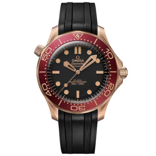 The OMEGA Seamaster Diver 300M Co-Axial Master Chronometer 42mm Watch features a black dial with wave pattern, OMEGA Bronze Gold accents, a red bezel with bold numerals, luminous markers, black rubber strap, and Calibre 8806 movement.