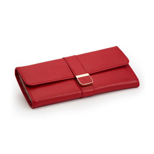 Introducing the WOLF 1834 Palermo Jewellery Roll by WOLF: a red leather travel accessory with a rectangular form and fold-over flap, perfect for storing your valuables on the go. It includes a slim strap secured by a gold-tone buckle on the front, elegantly displayed against a plain white background.