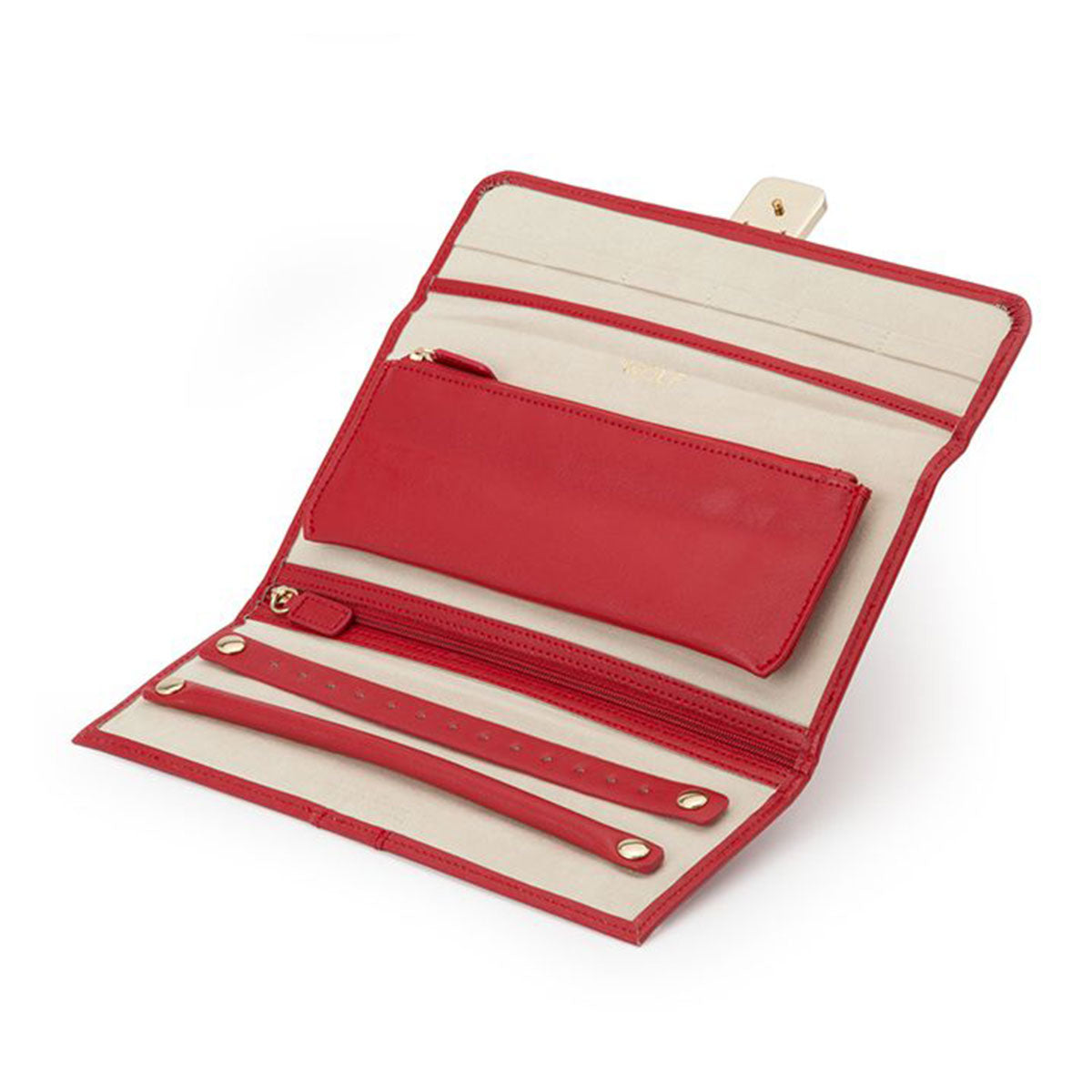 The WOLF 1834 Palermo Jewellery Roll by WOLF is an elegant red leather travel jewelry case, designed for optimal organization and storage. It includes multiple compartments such as a small zippered pouch, an earring holder with snaps, and a velvet-lined section for rings. Your treasures are kept secure with its gold snap closure.