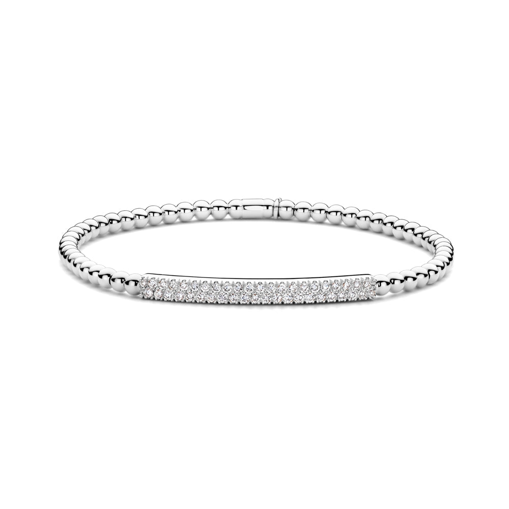 The Hulchi Belluni 18K White Gold Diamond Bracelet features a delicate silver beaded design with a curved bar adorned with sparkling round brilliant diamonds, displayed on a white background.