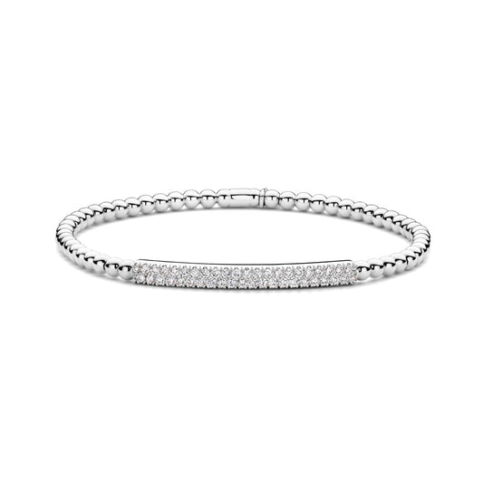 The Hulchi Belluni 18K White Gold Diamond Bracelet features a delicate silver beaded design with a curved bar adorned with sparkling round brilliant diamonds, displayed on a white background.