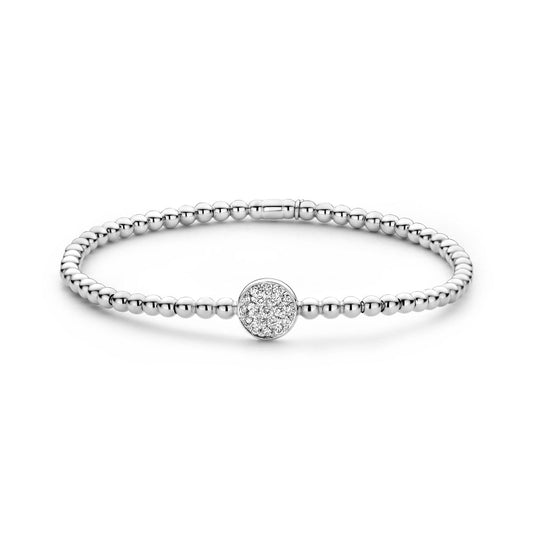 The Hulchi Belluni 18K White Gold Diamond Bracelet features a delicate silver beaded design with a 0.20 CTW round crystal-encrusted central charm, crafted by Hulchi Belluni and shown on a white background.