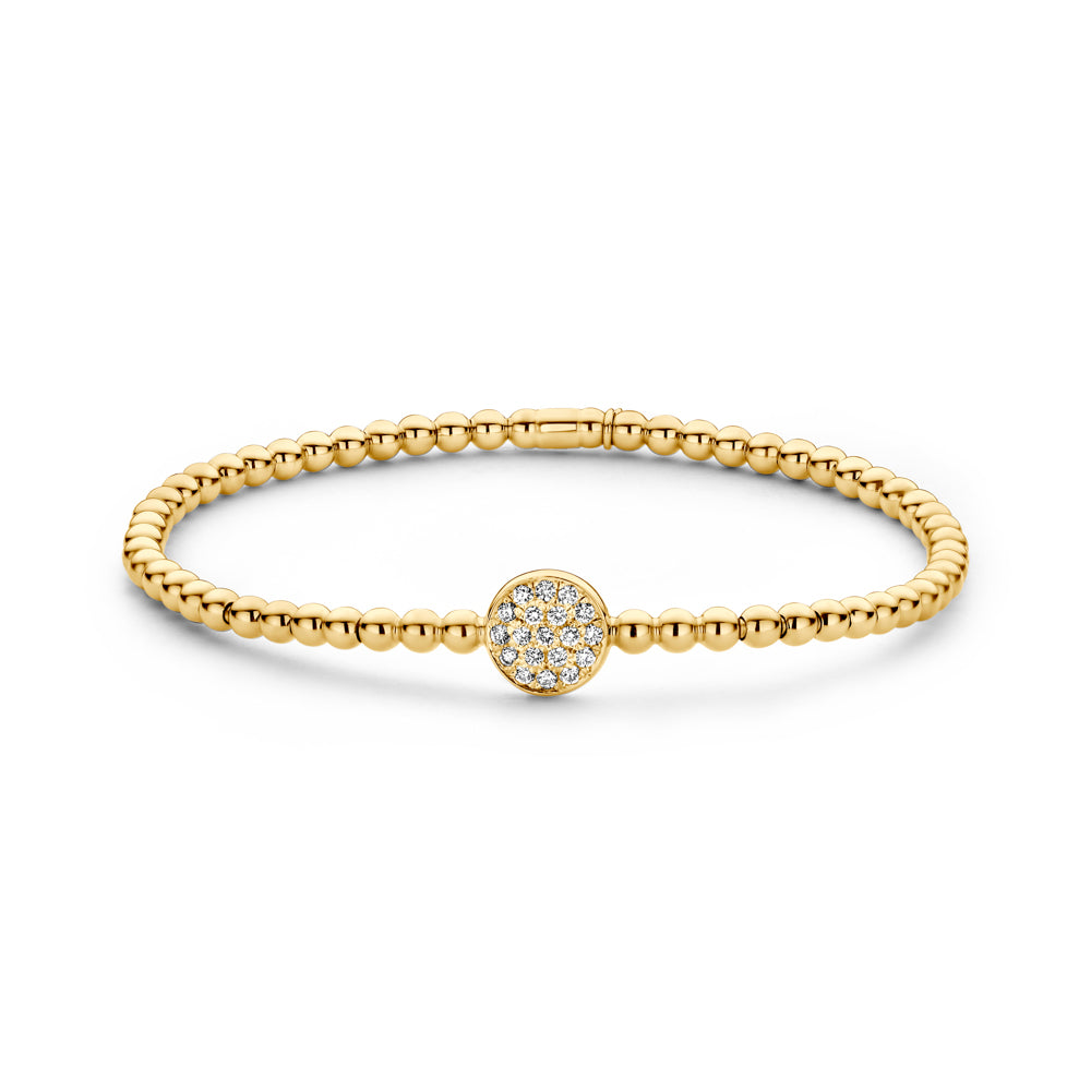 The Hulchi Belluni18K Yellow Gold Diamond Bracelet by Hulchi Belluni features a gold beaded design with a round centerpiece set with 0.20 CTW Round Brilliant Diamonds, crafted in luxe 18K yellow gold and shown on a white background.