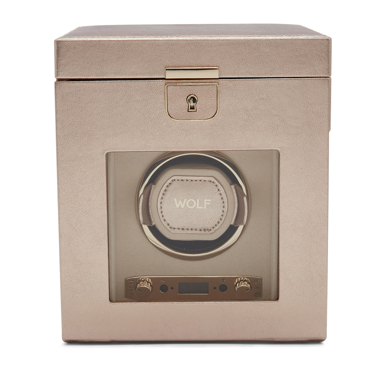 The WOLF 1834 Palermo Single Winder With Jewellery Storage is a luxurious square gold watch winder featuring a transparent front panel and showcasing a single watch holder. The device is secured with a gold latch and offers rotation options via its small control panel at the base. The brand name "WOLF" is prominently displayed on the holder.