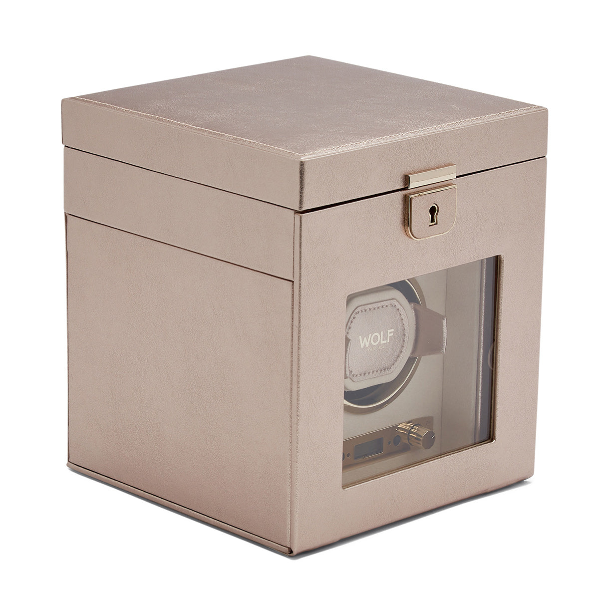 The WOLF 1834 Palermo Single Winder with Jewellery Storage, featuring a chic and contemporary design, displays a wristwatch through its transparent window. This beige winder includes various rotation options and a front lockable clasp for added security.