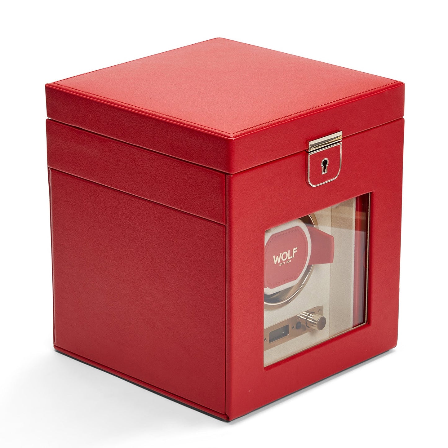 The WOLF 1834 Palermo Single Watch Winder with Jewelry Storage in red leather features a transparent section that reveals its intricate mechanism. The front is adorned with a metal clasp, and the interior showcases the "WOLF" logo, complete with a lock-in dynamic cuff for secure placement.