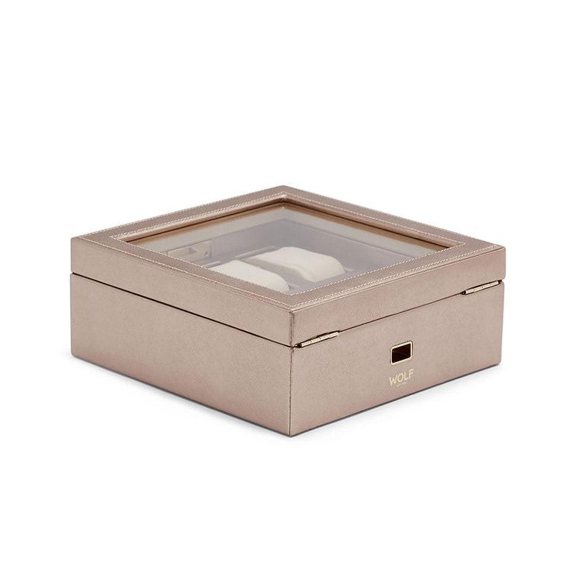 The WOLF 1834 Palermo 6 Piece Watch Box, featuring a beige leather exterior and a transparent lid, elegantly showcases two watches with its minimalist design and "WOLF" embossed on the front. Its thoughtfully designed compartments ensure that your timepieces remain beautifully organized.