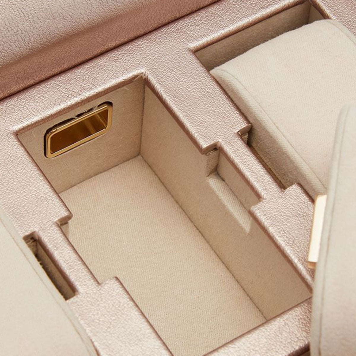 A detailed look at the WOLF 1834 Palermo 6 Piece Watch Box reveals its luxurious beige and gold-toned interior. The meticulously designed watch compartments make it perfect for organizing your collection, while the textured lining exudes elegance akin to a refined leather watch box.