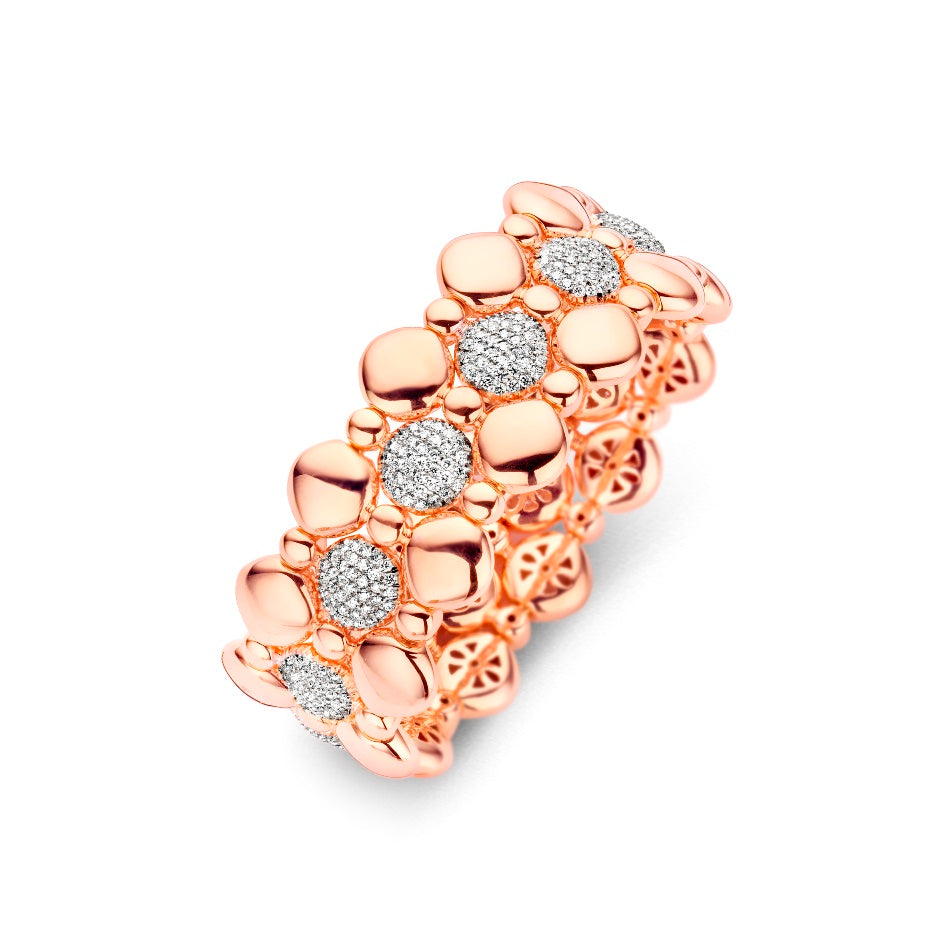 The Hulchi Belluni Tresore 18K Rose Gold Bracelet by Hulchi Belluni features a floral-inspired design with alternating polished petals and clusters of sparkling round brilliant diamonds.