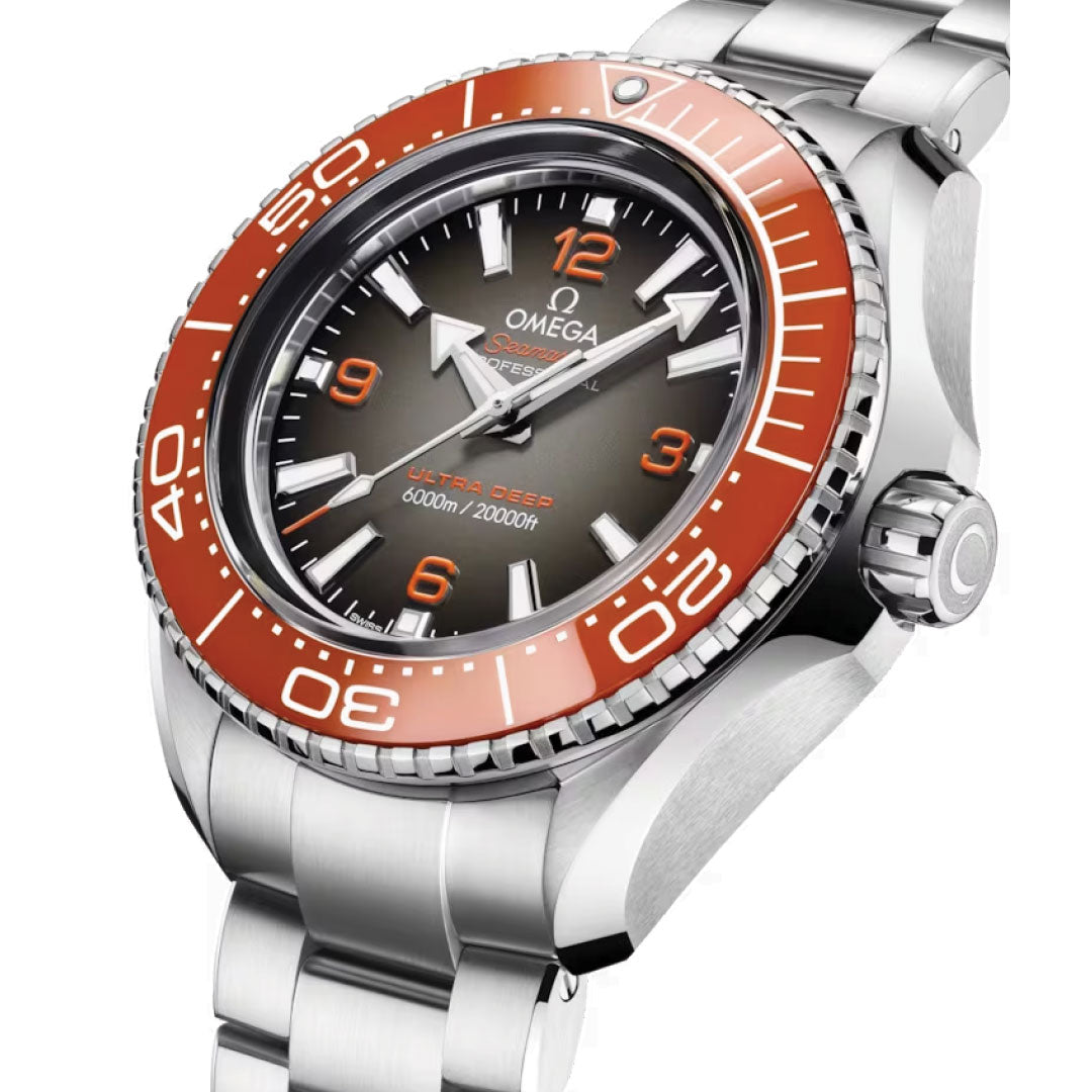 The OMEGA Seamaster Planet Ocean 6000M Ultra Deep Co-Axial Master Chronometer 45.5mm Watch features a stainless steel strap and an orange bezel. The silver dial is striking with large numbers and prominently displays "Ultra Deep" alongside "6000 m / 20000 ft," underscoring its remarkable water-resistant capabilities.