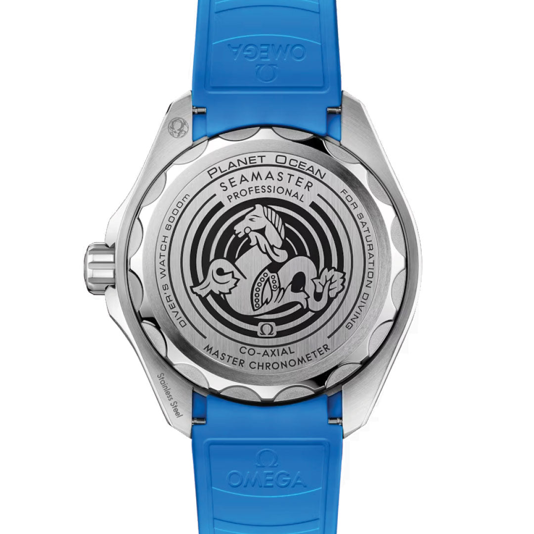 The image shows the back view of an OMEGA Seamaster Planet Ocean 6000M Ultra Deep Co-Axial Master Chronometer 45.5mm watch with a blue strap. The caseback features ocean-themed engravings, including the iconic OMEGA Seahorse, highlighting its status as a professional divers' water-resistant timepiece with Co-Axial Master Chronometer certification.