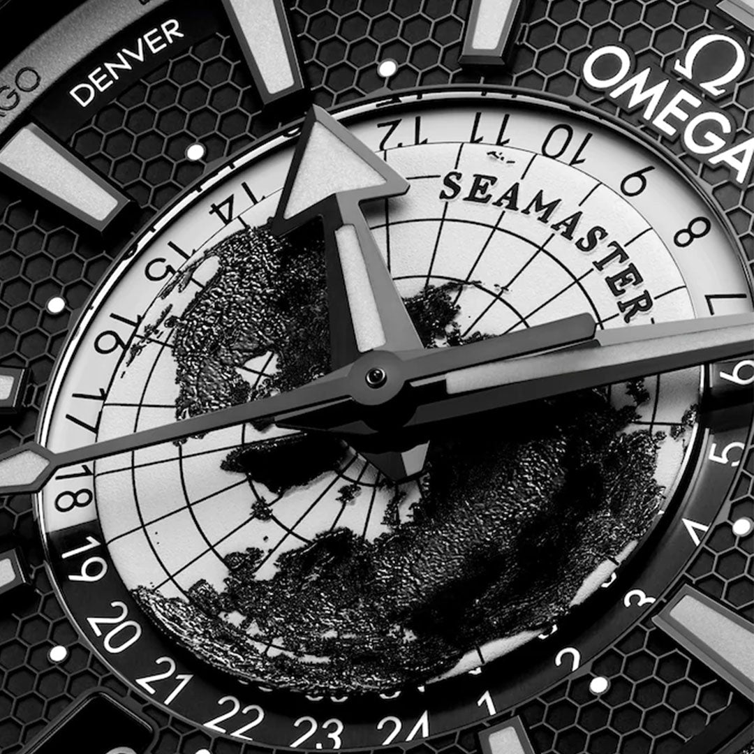 Close-up of the OMEGA Seamaster Planet Ocean 600m Co-Axial Master Chronometer 43.5mm dial, showing bold hands, indices, and OMEGA branding.