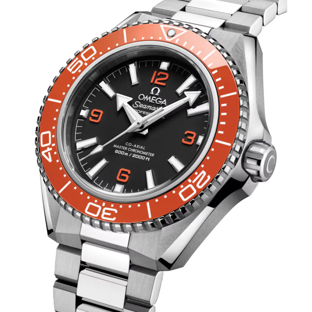 The OMEGA Seamaster Planet Ocean 600M Co-Axial Master Chronometer 42mm watch features a black dial, silver markers, orange numerals, and an orange bezel, displayed at an angle on a matching stainless steel bracelet.