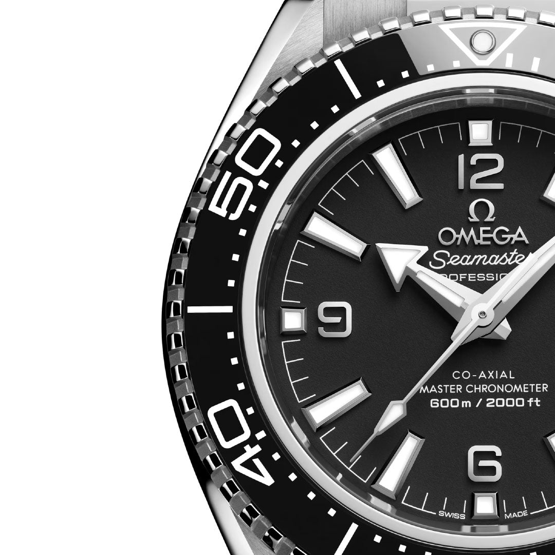 Close-up of the OMEGA Seamaster Planet Ocean 600M Co-Axial Master Chronometer 42mm Watch, featuring a black dial, white markers, bold hands, and a rotating bezel with large numerals. Dial reads "600m/2000ft" and "Co-Axial Master Chronometer.