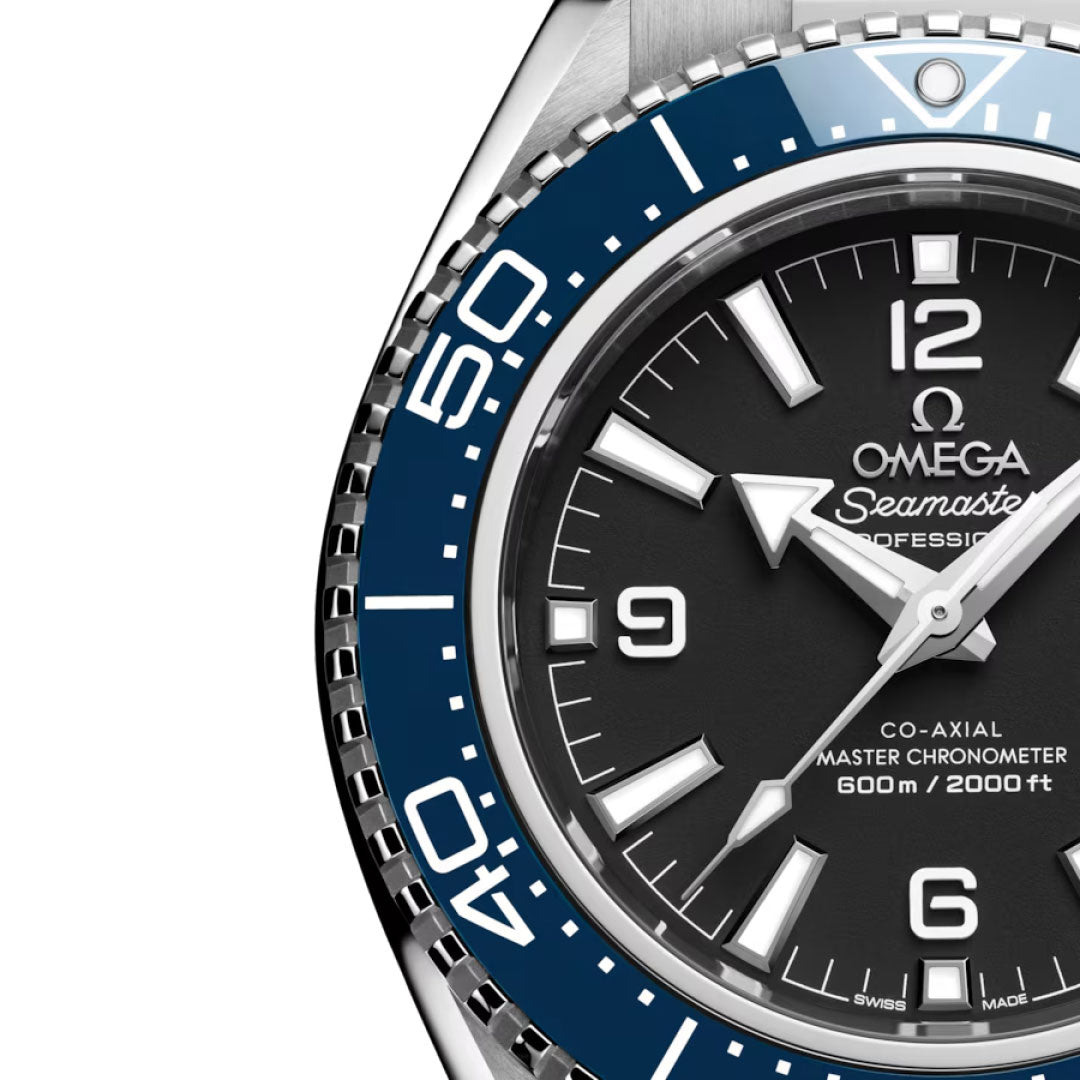Close-up of the OMEGA Seamaster Planet Ocean 600M Co-Axial Master Chronometer 42mm Watch, featuring a black dial, white hour markers, blue bezel, and water resistance to 600 meters.