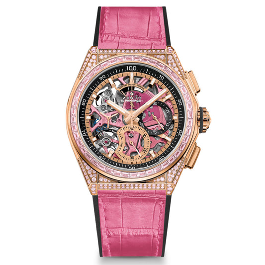 The ZENITH Defy El Primero 21 El Primero 9004 watch from Zenith features a luxurious rose gold skeleton design with a visible intricate mechanism, diamond-adorned bezel, and pink alligator leather strap. Its dial includes a small subdial and multiple hands.