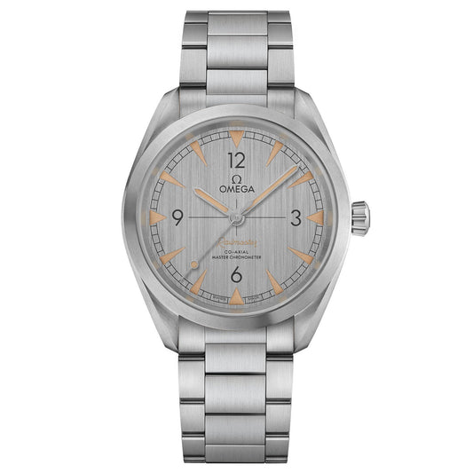 The OMEGA Seamaster Railmaster Co-Axial Master Chronometer 40mm Watch boasts a classic design with a stainless steel bracelet, gray dial, and triangular gold hour markers. It prominently showcases the OMEGA brand name and logo on the dial, with clearly labeled hour and minute hands.