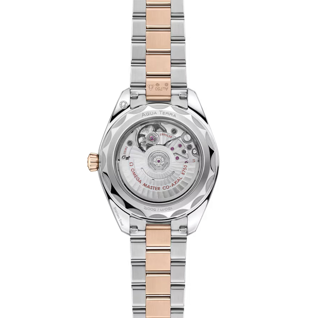 Back view of the OMEGA Seamaster Aqua Terra 150M Co-Axial Master Chronometer 30mm Watch, featuring a silver and rose gold band, transparent case back, and visible movement. Engraved: “AQUA TERRA” and “OMEGA MASTER CO-AXIAL.”.